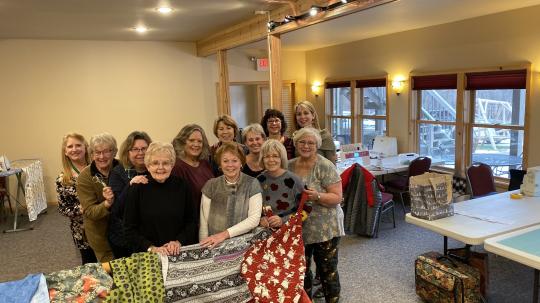 A group of quilters in the Grand Vermilion Chalet