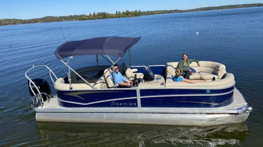 Friends heading out on a 150HP Triple-toon.