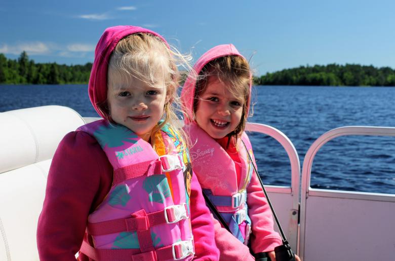 Girls enjoy a boat ride