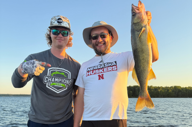 Guide Jake Panichi and a happy client with a beautiful Lake Vermilion walleye
