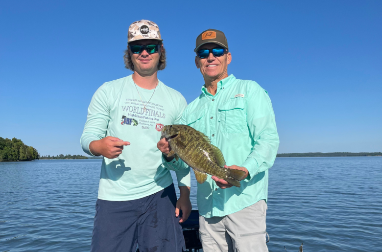 Guide Jake Panichi and a client on a beautiful day with a nice bass. 