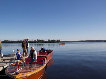 Classic wooden boats, hosted at Pehrson Lodge, prepare for the Classic and Antique boat show on Labor Day Weekend.