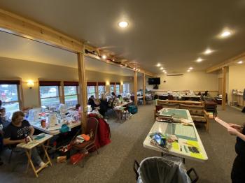 A crafting group in the Grand Vermilion Chalet