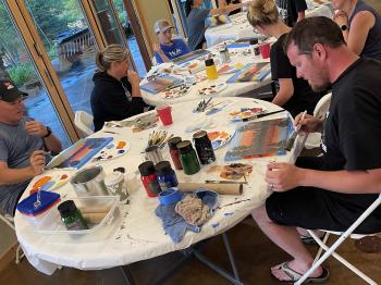 Instructor led painting class in the lodge.