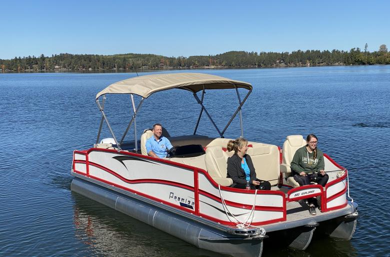 Fishing in a comfortable, 150HP triple-toon.