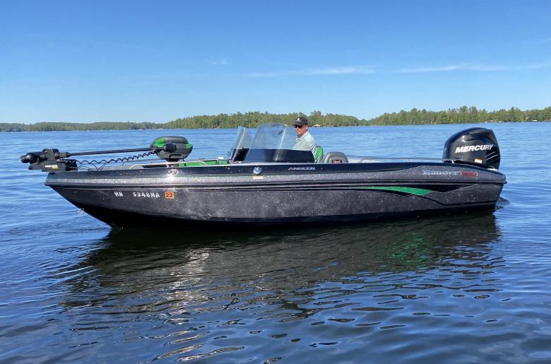 Ranger 200HP boating along Lake Vermilion shoreline.