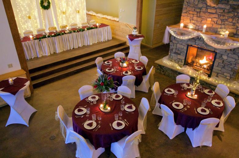 Tables near the fireplace in the Main Lodge