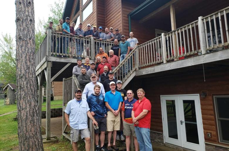 A retreat group on the stairs of the Grand Vermilion Chalet