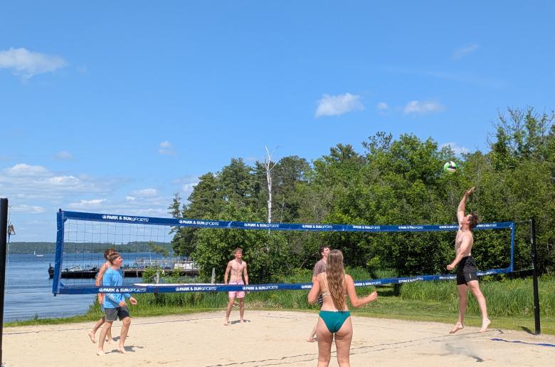 Beach volleyball game between cousins.