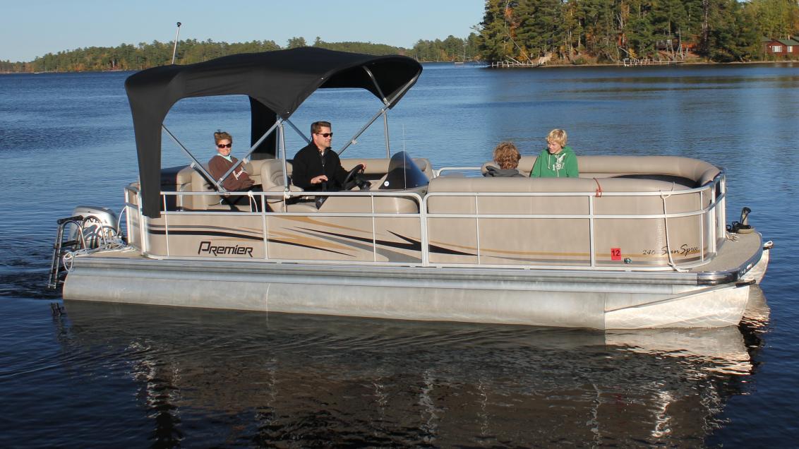 Family on pontoon boat
