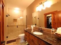 Master bedroom bathroom with shower and granite.
