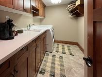 Laundry room with utility sink.